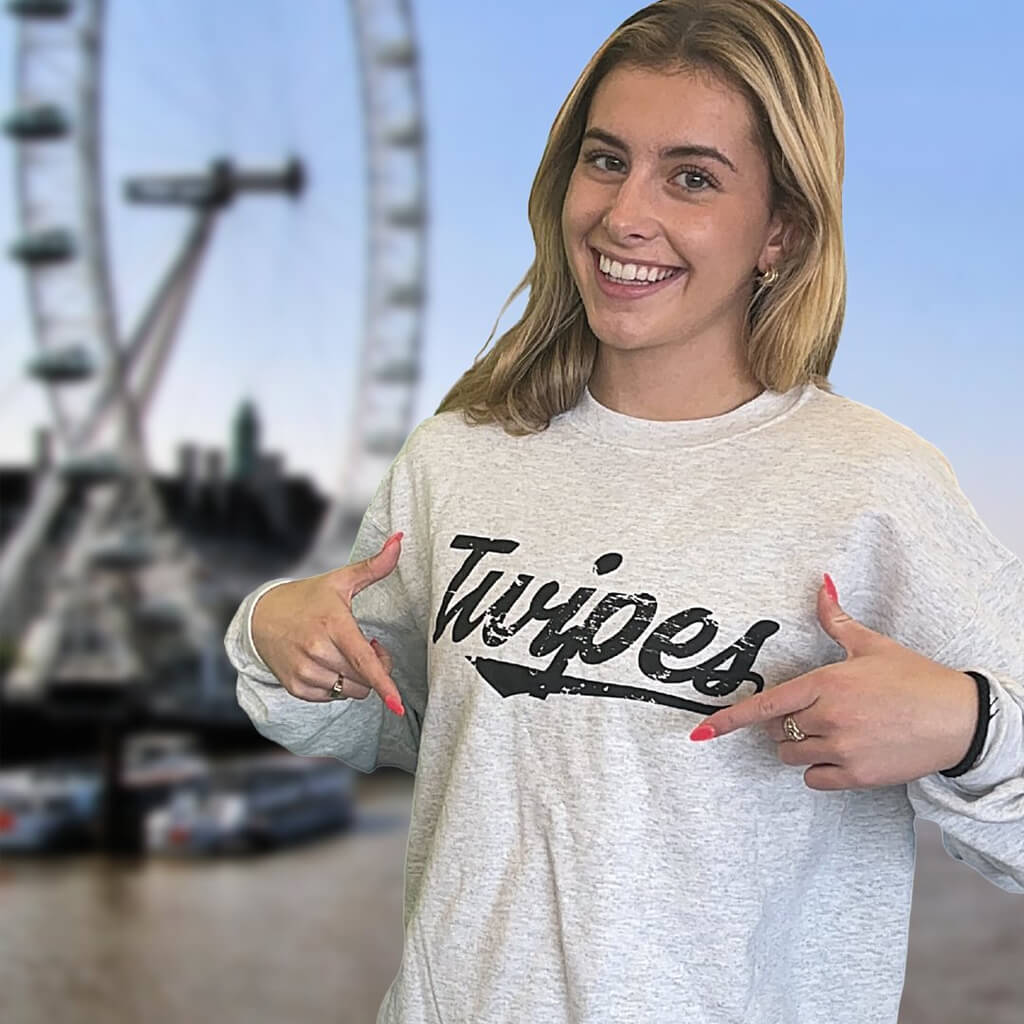 Womens Rowing Twipes Instagram post Social media post of a woman pointing at the Twipes logo on her sweatshirt