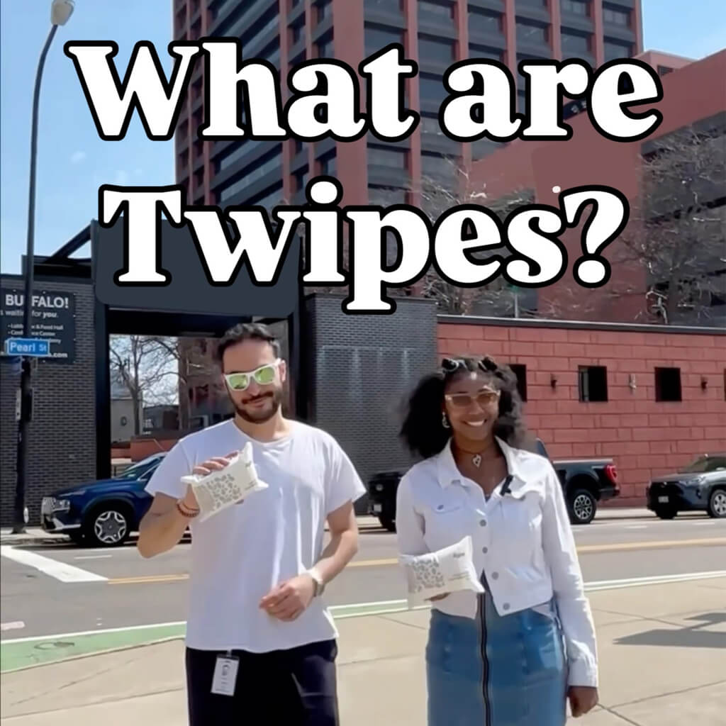 Al and Elle Instagram post Social media post of a man and woman stand in front of an office building